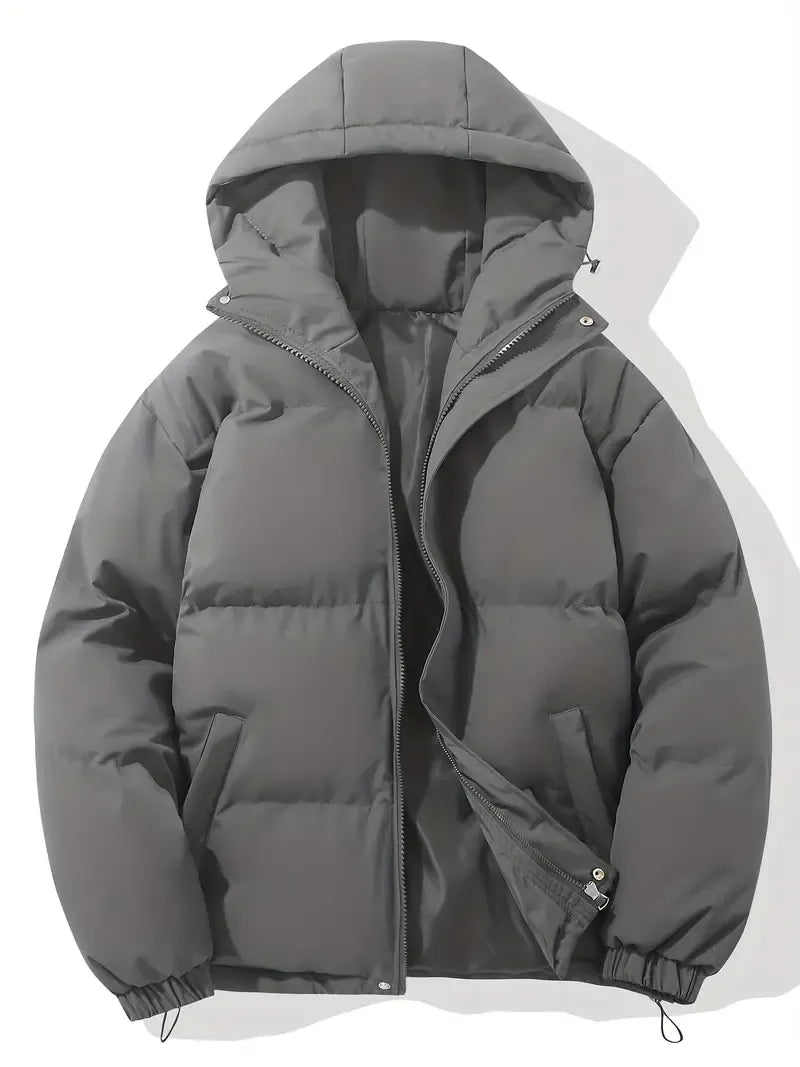 Women's puffer jacket in black featuring full-length zip closure and elasticated cuff detailing