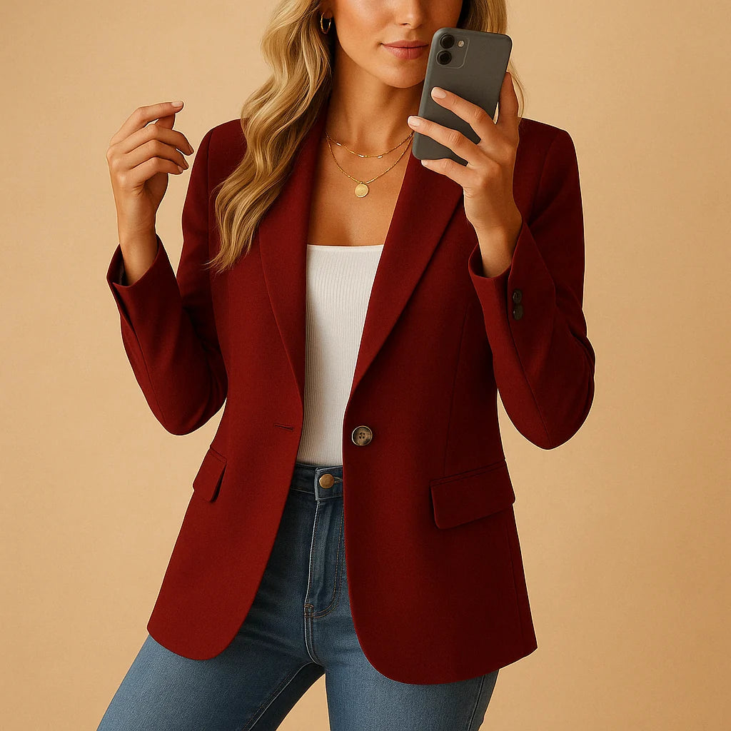 Back view of women's tailored blazer showing straight hem and tailored fit across shoulders