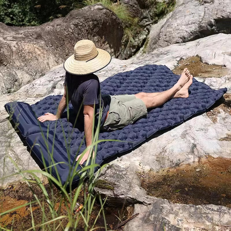 Full setup of double inflatable camping mat displaying spacious sleeping surface for couples