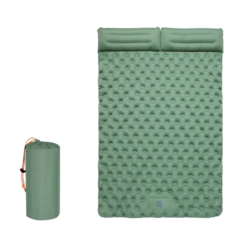 Close-up view of textured air-cushioned surface on double camping mat with inflatable pillow detail