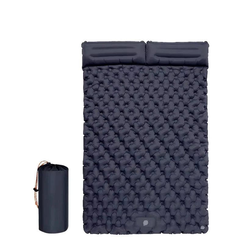 Camping mat shown partially inflated demonstrating air-cushioned texture and waterproof construction