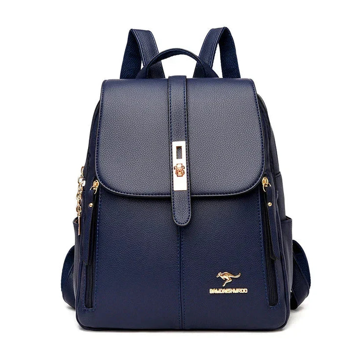 Close-up view of men's black leather backpack showing textured finish and adjustable shoulder straps
