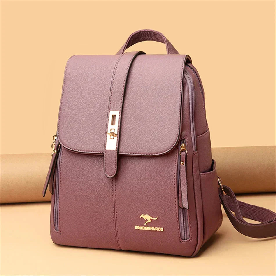 Detail shot of men's leather backpack flap closure with decorative metal buckle and zip fastening