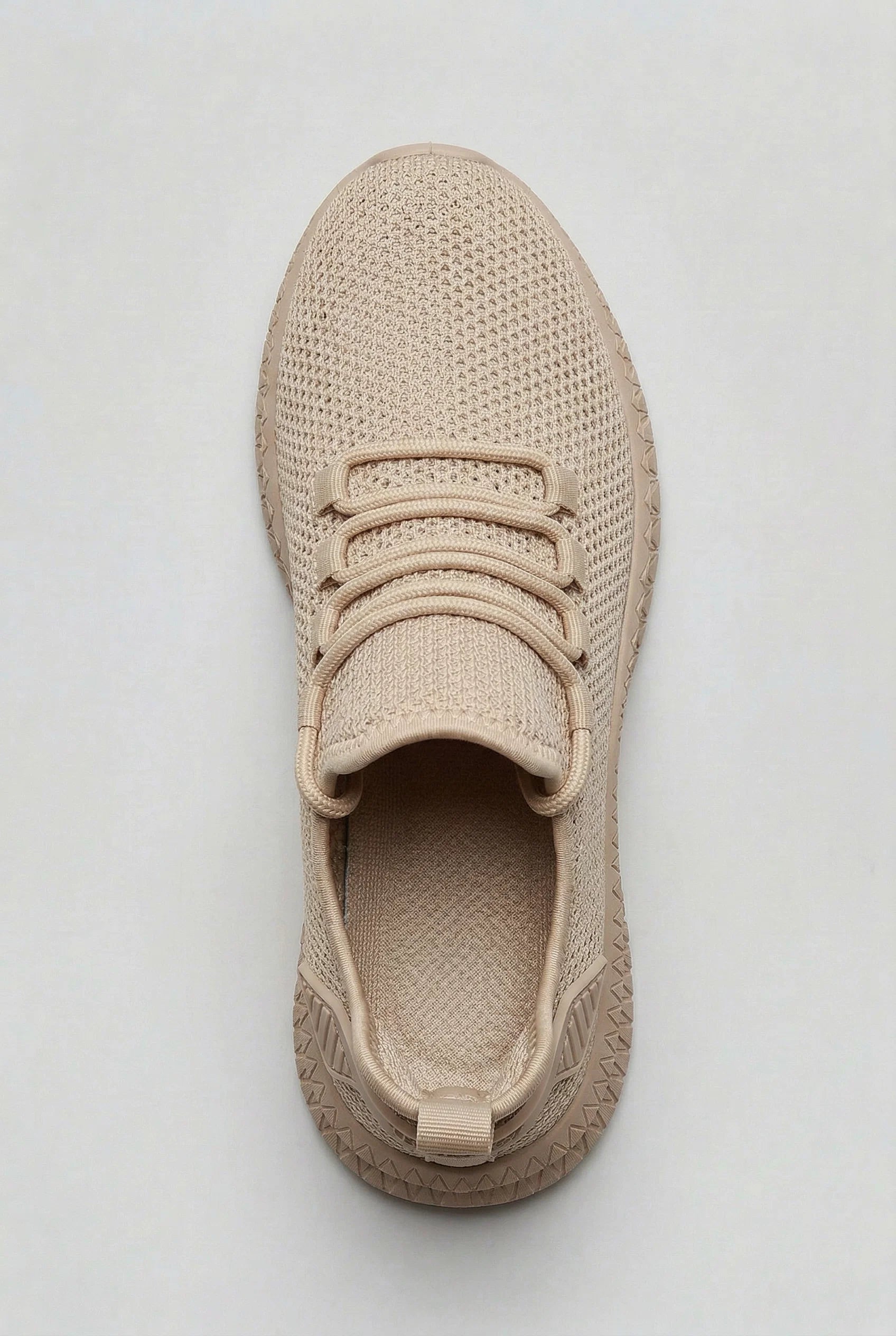 Top view of men's mesh trainers displaying lace-up closure and breathable mesh construction