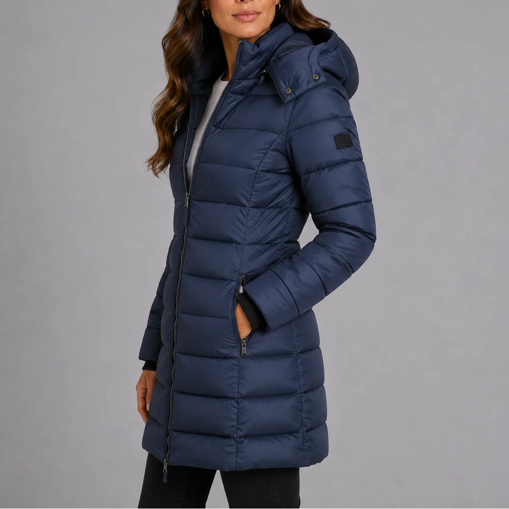 Women's hooded puffer jacket navy side view showing fitted silhouette and mid-thigh length