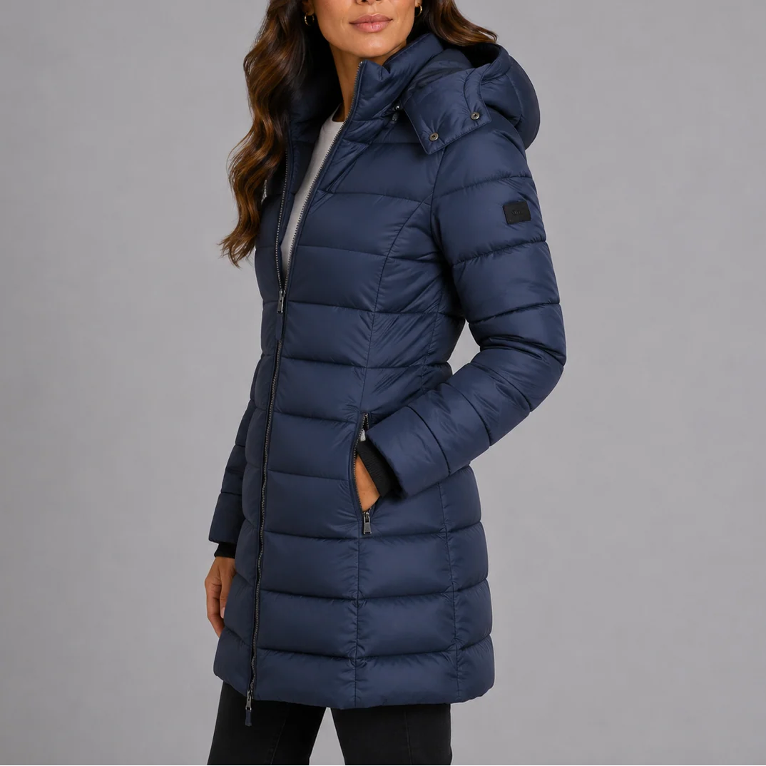 Women's hooded puffer jacket navy side view showing fitted silhouette and mid-thigh length