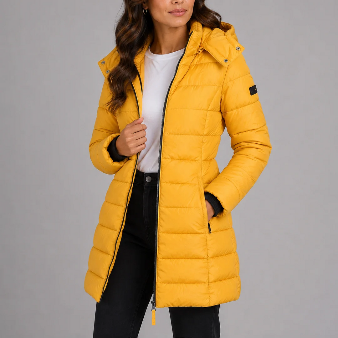 Women's puffer jacket navy detail showing side zip pocket and ribbed cuffs