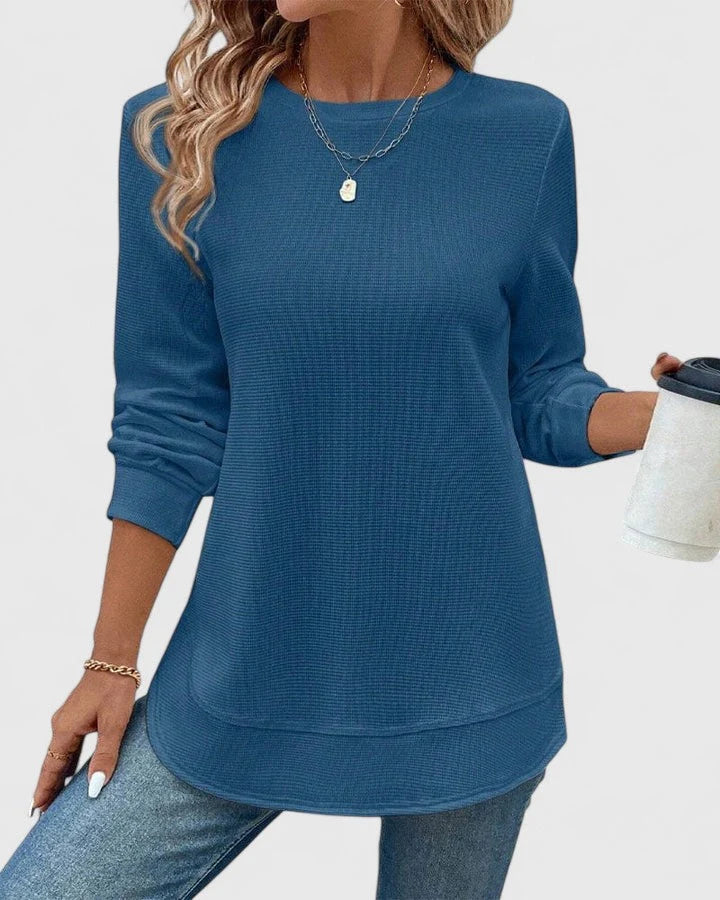 Women's ribbed knit jumper in teal blue with crew neck and long sleeves, relaxed fit