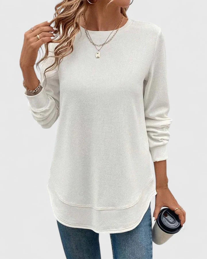 Back view of women's ribbed knit jumper showing crew neck and relaxed fit silhouette