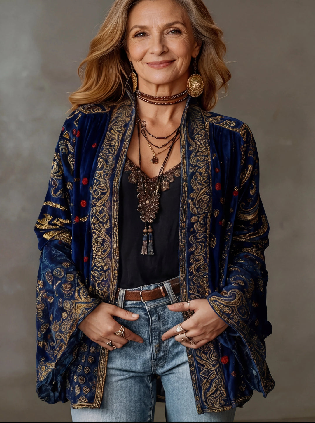 Close-up view of the intricate tapestry pattern and velvet-touch finish on the bohemian cardigan with decorative trim detailing