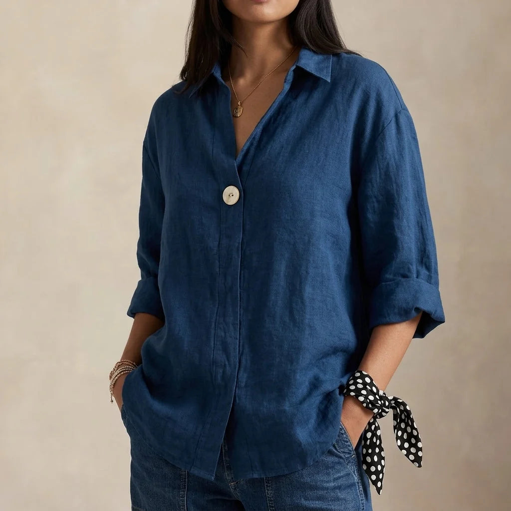 Back view of relaxed linen blouse showing relaxed silhouette and regular length