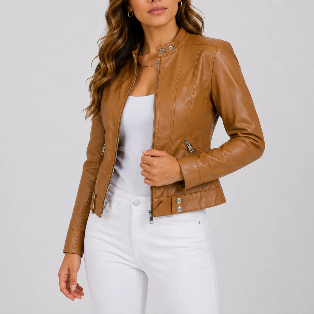 Detail shot of women's biker jacket featuring structured fabric and metal zip hardware