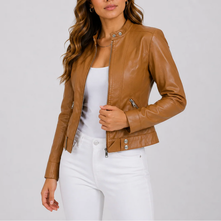 Detail shot of women's biker jacket featuring structured fabric and metal zip hardware