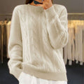 Close-up view of cable knit pattern on women's relaxed fit jumper
