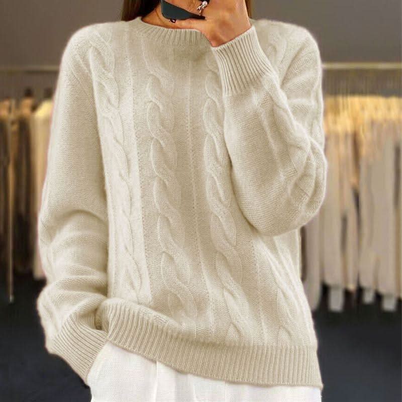 Close-up view of cable knit pattern on women's relaxed fit jumper