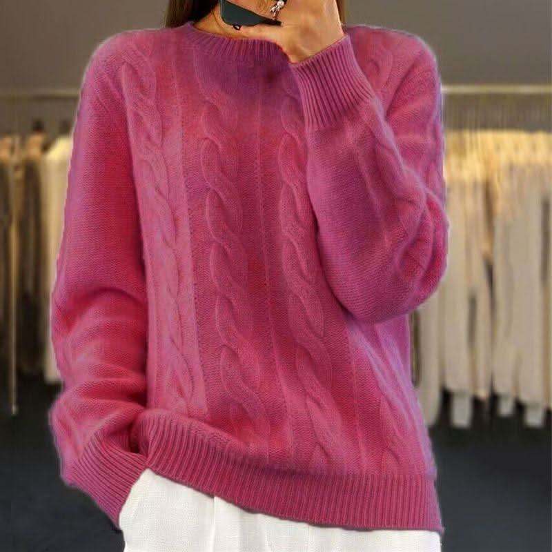 Full-length view of women's cable knit jumper with classic ribbed trims