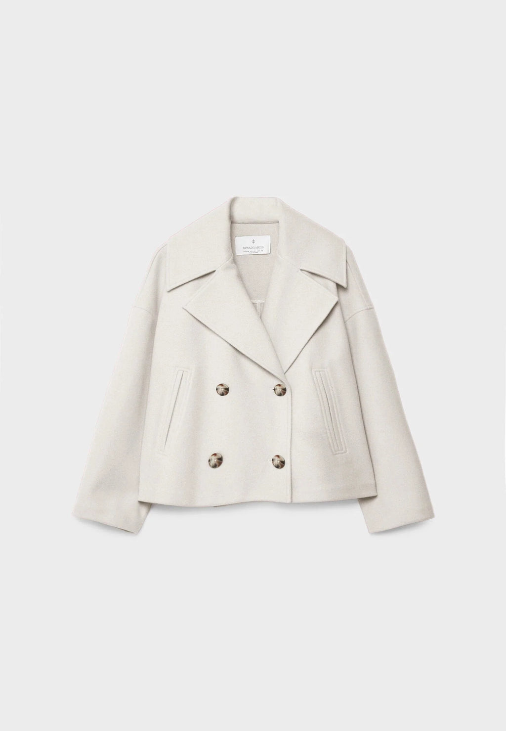Back view of cropped blazer showing relaxed shoulder line and clean hemline
