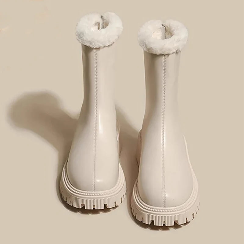 Women's fleece ankle boots in beige with plush faux-fur trim and chunky tread sole for winter warmth