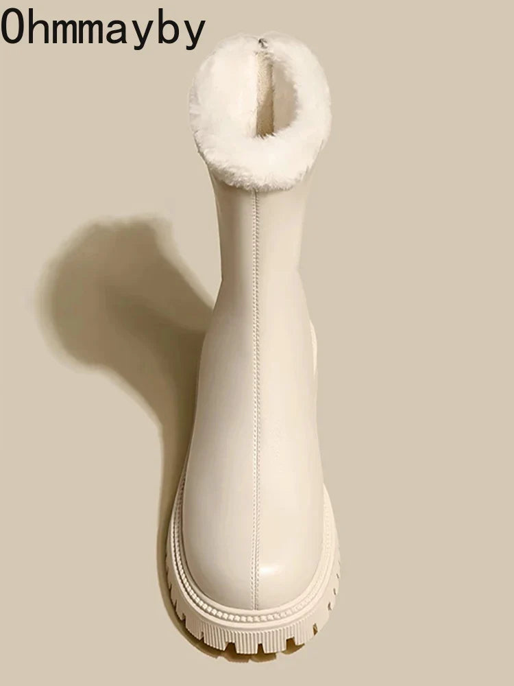 Side profile of women's fleece lined ankle boots with ridged sole and fold-over fur trim
