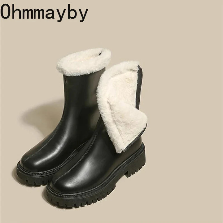 Detail shot of faux-fur trim and zip closure on women's fleece ankle boots