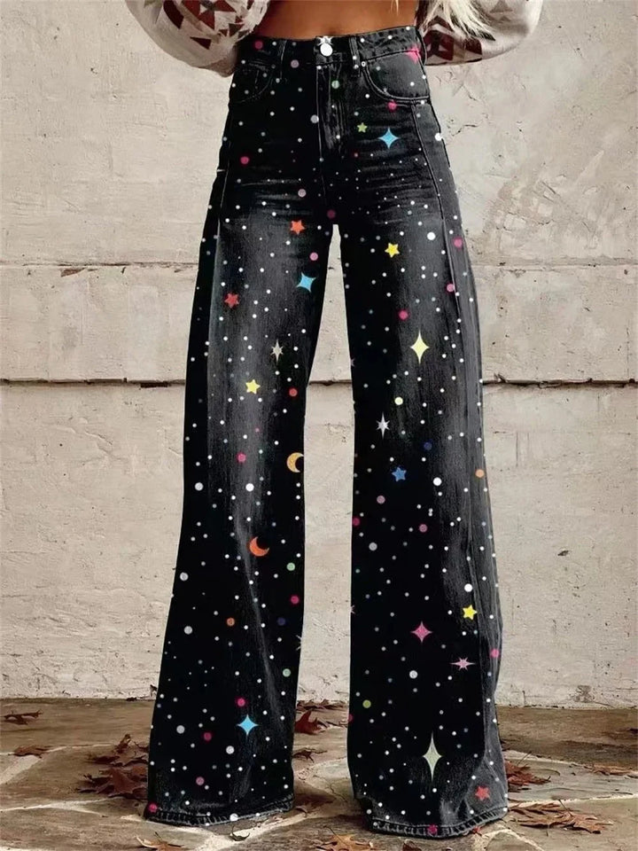 Women's high waist wide leg trousers with celestial star and moon print on dark denim-look fabric