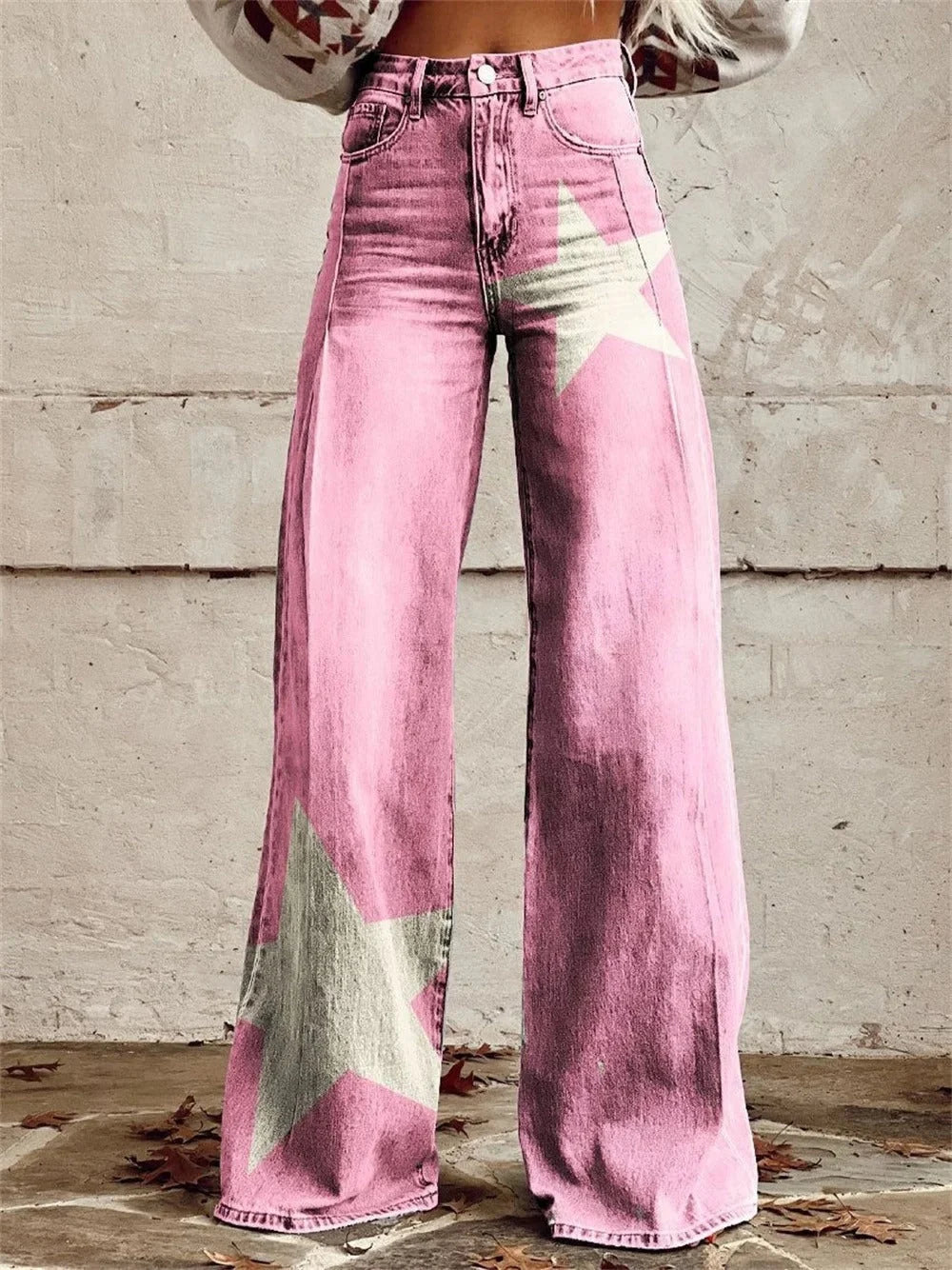 Full length women's high waist trousers with wide leg silhouette and scattered star print detail