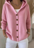 Close-up of hooded cardigan showing soft ribbed knit texture and button detail