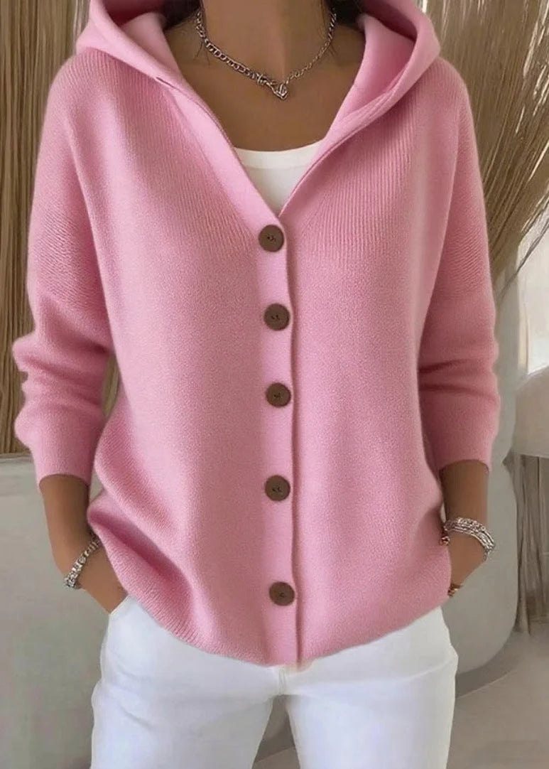 Close-up of hooded cardigan showing soft ribbed knit texture and button detail