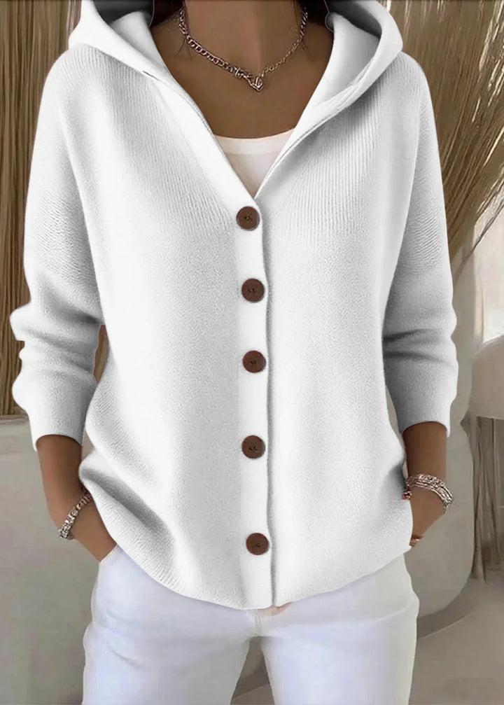 Side view of women's hooded cardigan displaying relaxed silhouette and long sleeves