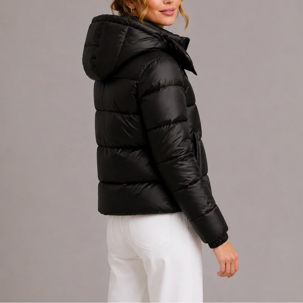 Women's cropped puffer jacket in navy with side pockets and insulated padding