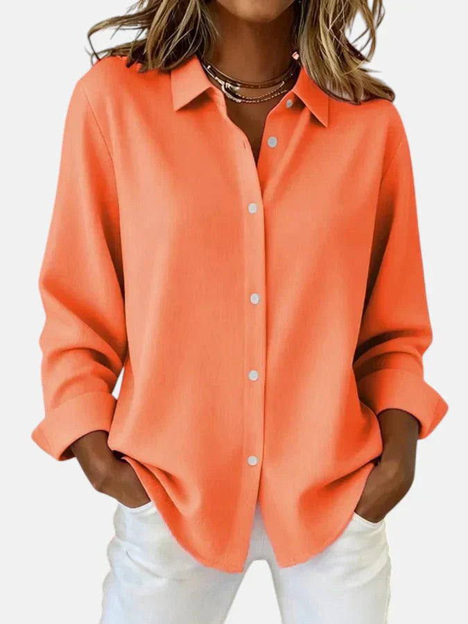Full-length view of relaxed fit shirt with classic collar and button closure, paired with casual bottoms