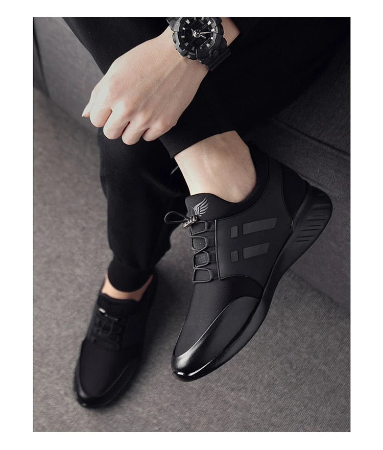 Rear view of men's lace-up trainers displaying padded ankle collar and heel counter