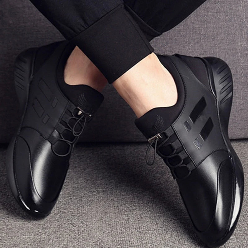 Front view of men's trainers highlighting wide toe box and rounded toe shape