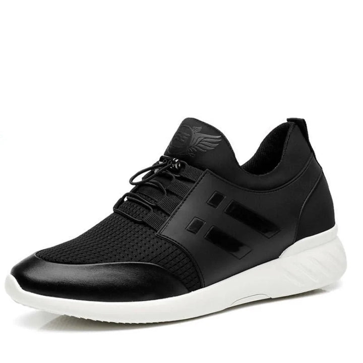 Men's trainers on grey surface showing flexible sole and supportive construction