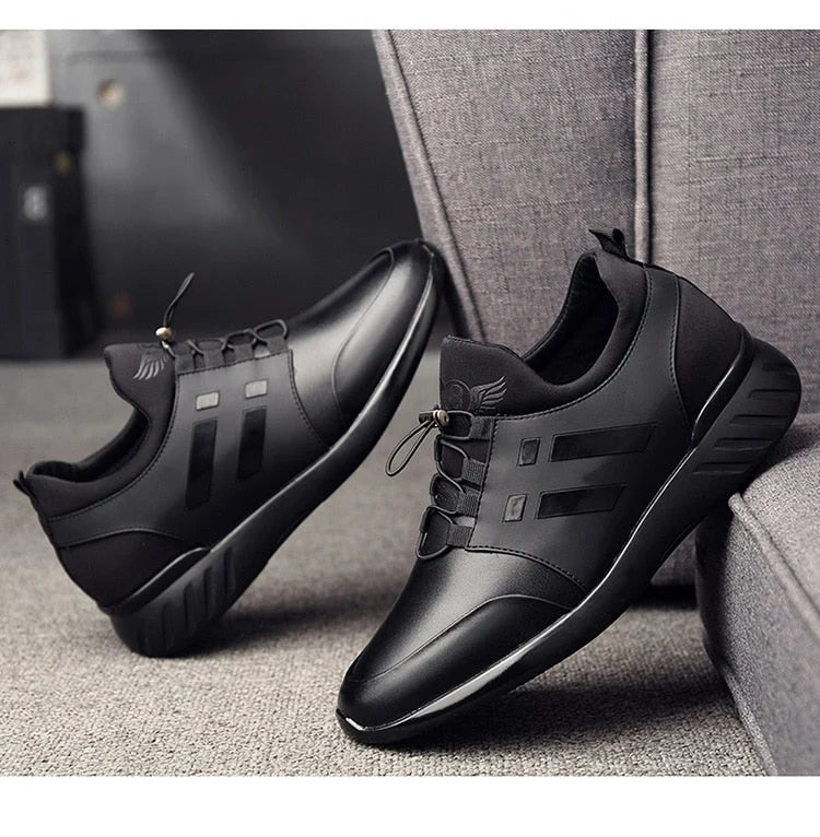 Overhead view of men's lace-up trainers displaying symmetrical design and clean lines