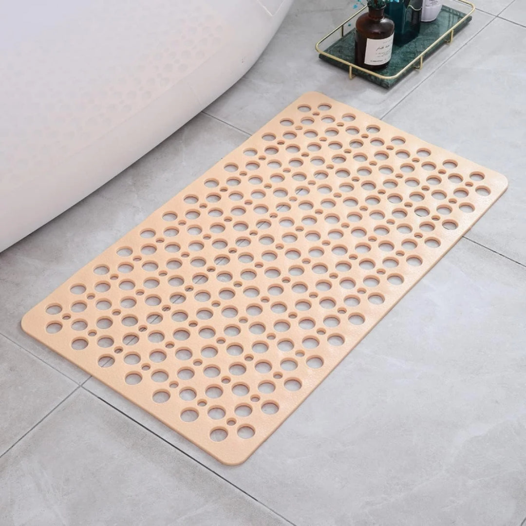 Perforated bath mat in light blue colour showing full rectangular shape