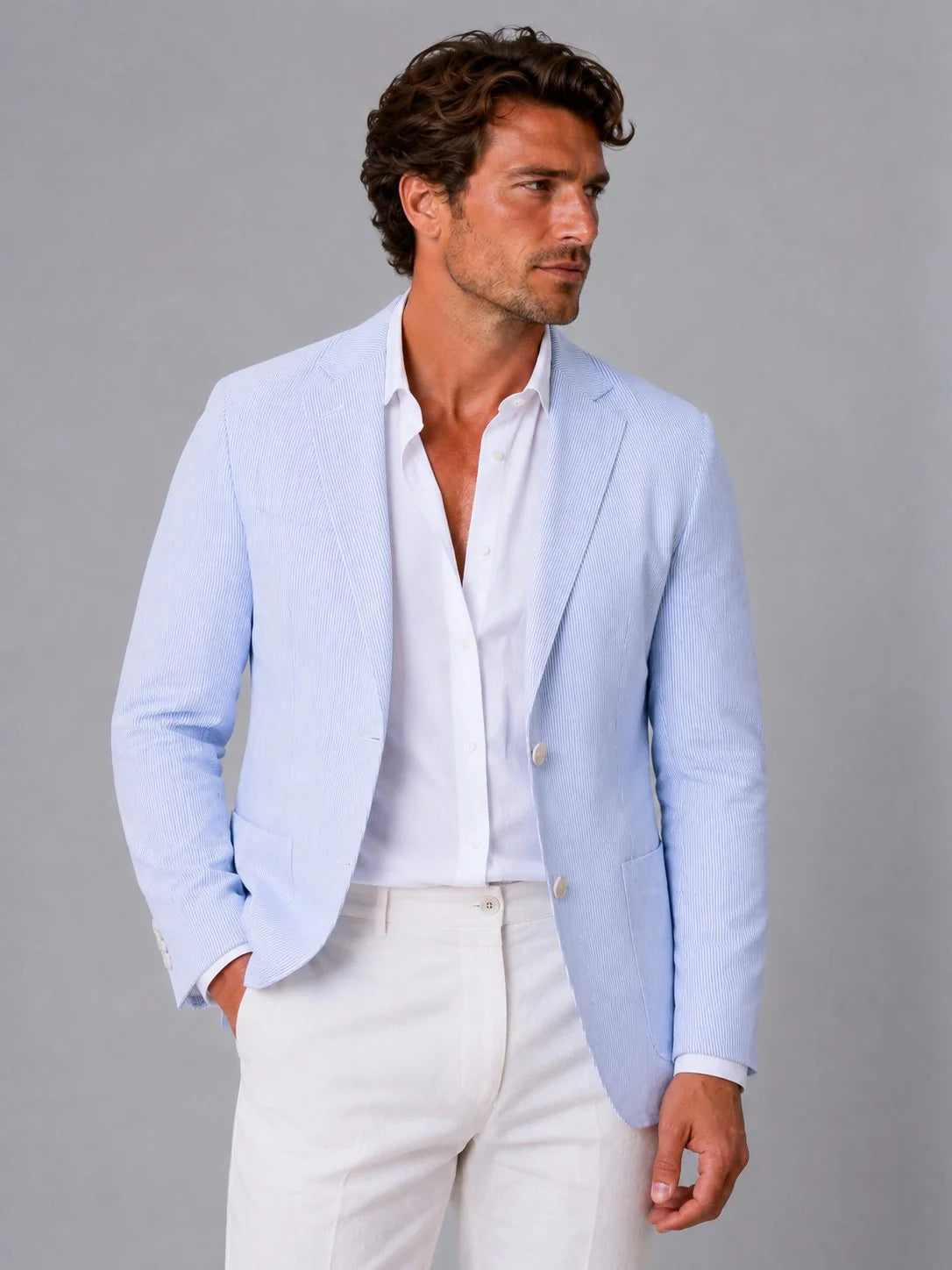 Front view of men's single-breasted seersucker blazer with two-button closure