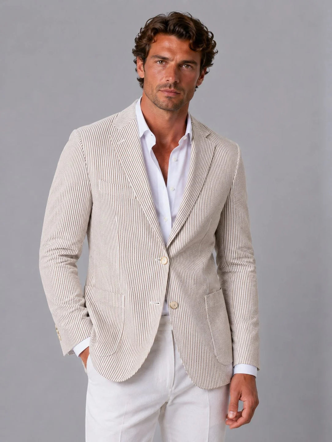 Men's seersucker blazer styled with white shirt and trousers