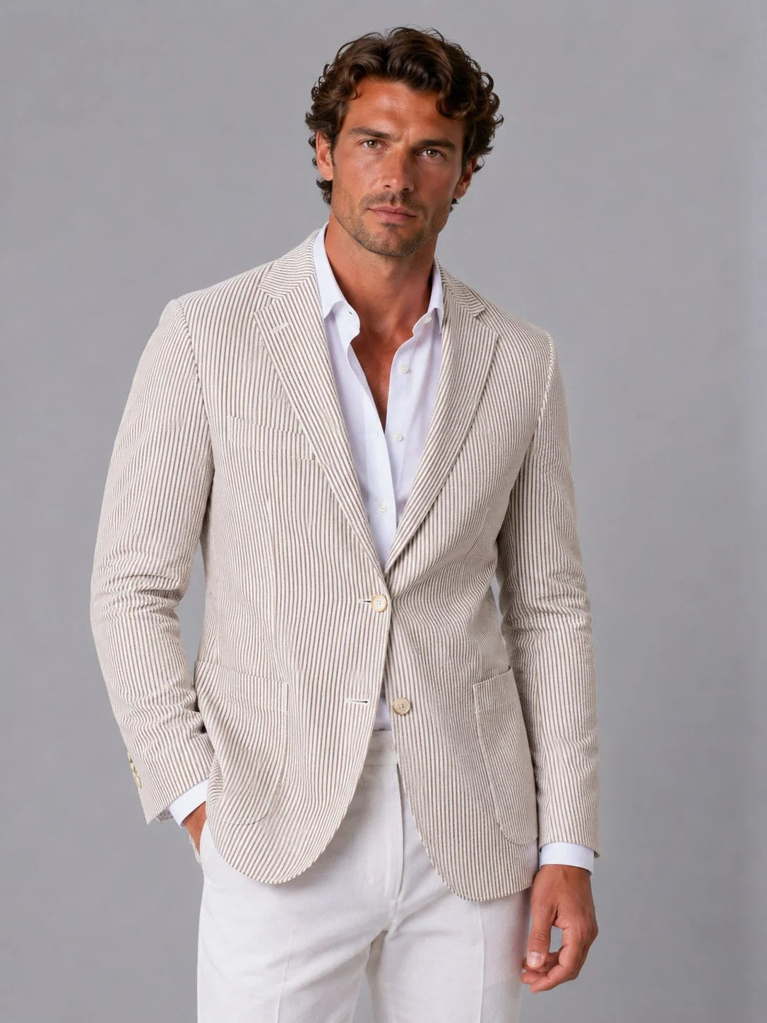 Men's seersucker blazer styled with white shirt and trousers