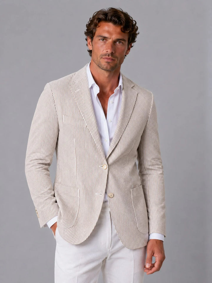 Men's seersucker blazer styled with white shirt and trousers