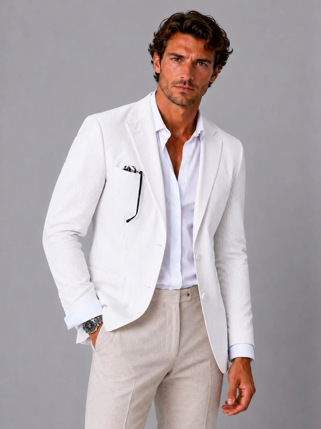 Full-length view of men's seersucker blazer in smart-casual outfit