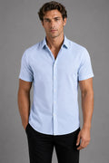 Men's short sleeve shirt in light blue with classic collar and button-through front, tailored fit silhouette