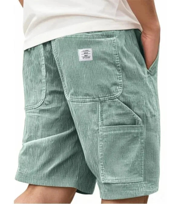 Men's corduroy cargo shorts displaying structured silhouette and functional design details