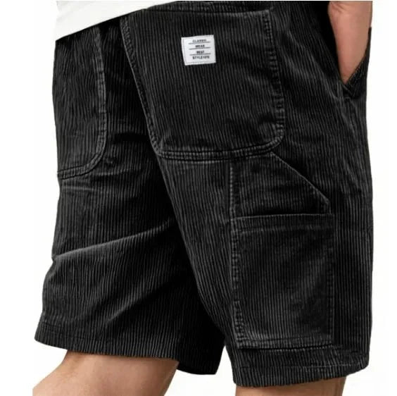 Side view of men's corduroy cargo shorts displaying cargo pocket placement and straight cut