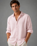 Men's relaxed linen shirt in soft pink with crinkle-weave texture and classic collar