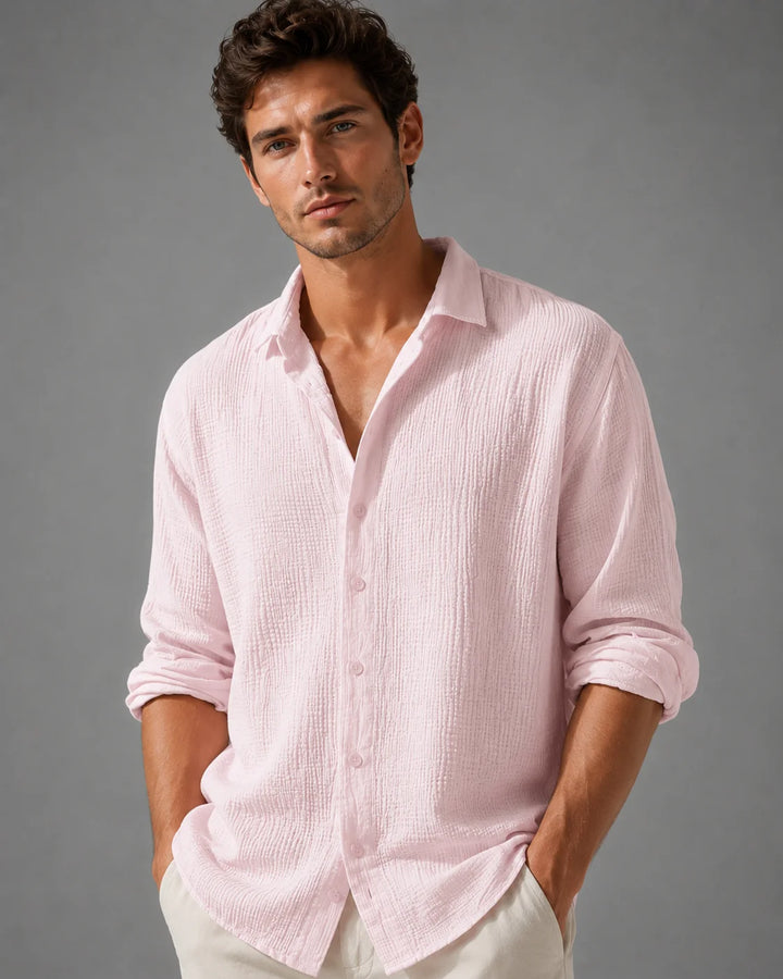 Men's relaxed linen shirt in soft pink with crinkle-weave texture and classic collar