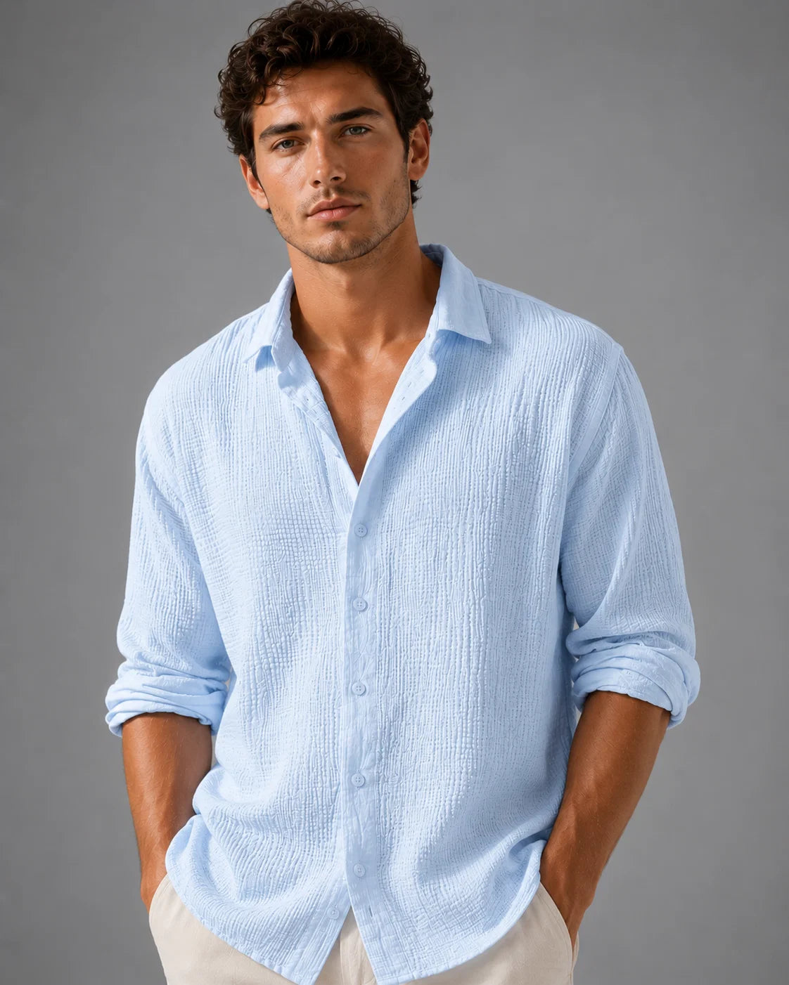Detail of men's linen shirt collar and button placket in soft pink shade