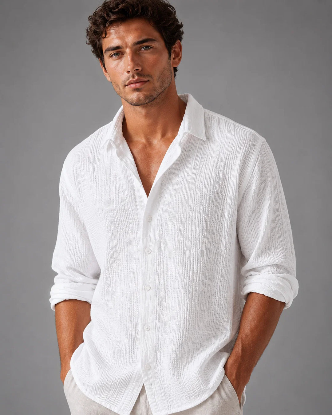 Men's relaxed linen shirt styled with rolled sleeves for casual warm-weather wear