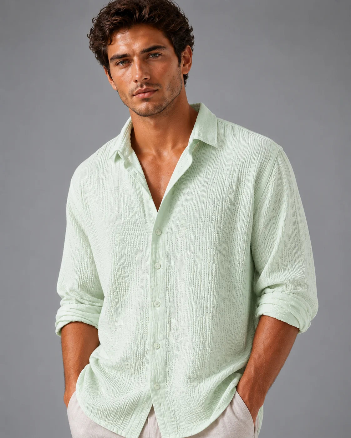 Back view of men's linen shirt showing relaxed cut and crinkle-textured fabric