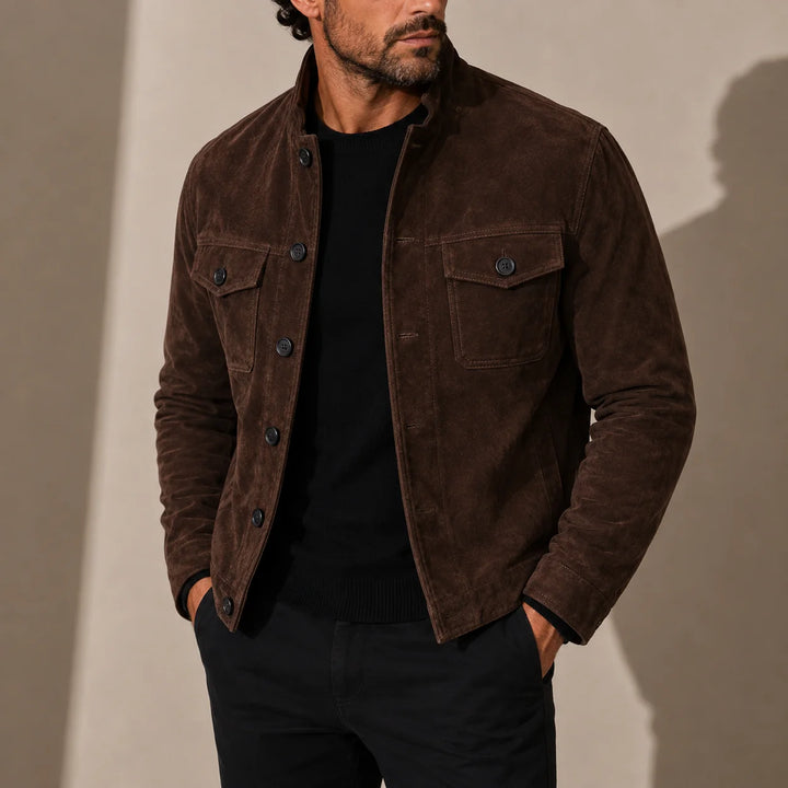 Men's suede jacket in brown with stand collar and button-up front, worn with black jumper and trousers